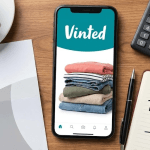 Professional and clean flat-lay of a smartphone and laptop used for online selling, representing tax compliance and Vinted sales tracking.